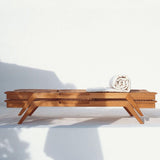 Synthesis stabelbar liggestol i teak